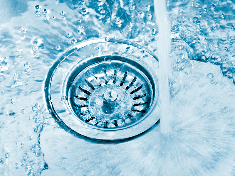 Water draining into sink drain